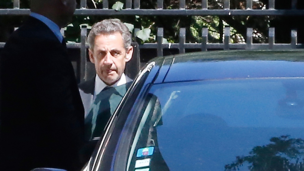 Nicolas Sarkozy leaves his house in Paris