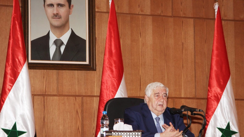 Syrian Foreign Minister Walid al-Moallem speaks at a press conference in Damascus, Syria, Monday, Dec. 19, 2011. (AP / Bassem Tellawi)
