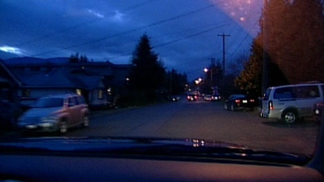 A driver navigates the streets of Nanaimo, B.C. at night. Dec. 19, 2011. (CTV)