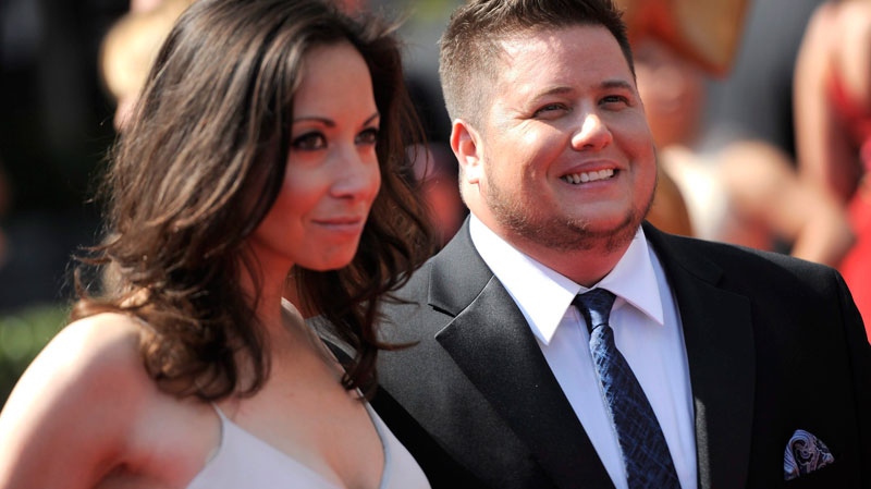 Chaz Bono, right, and Jennifer Elia arrive at the at the Primetime Creative Arts Emmy Awards on Saturday Sept. 10, 2011 in Los Angeles. (AP / Chris Pizzello)