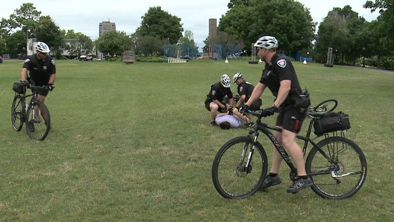 CTV's John Hua gets handcuffed after a strategic takedown demonstration by the Ottawa Police Bicycle Unit. (Photo: Tyler Fleming/CTV Ottawa)