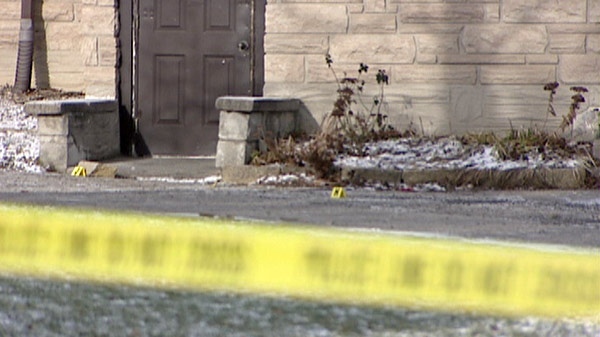 Police tape marks the scene of a murder outside the Masonic Lodge in Cambridge, Ont. on Saturday, Dec. 17, 2011.