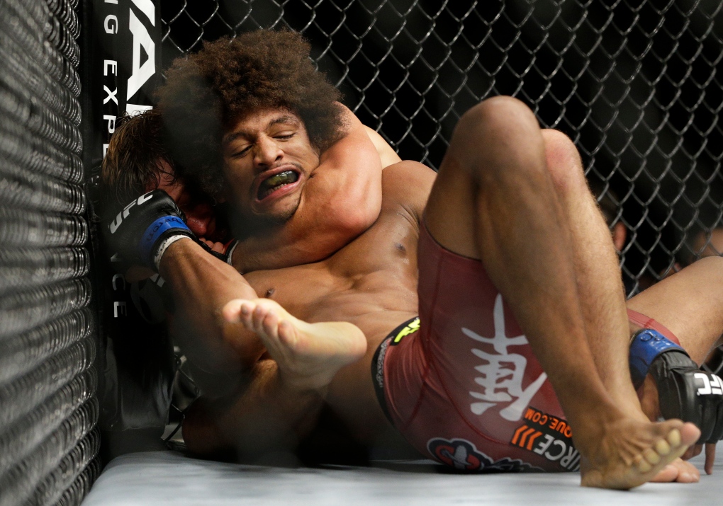 UFC 175: Faber chokes out Alex Caceres