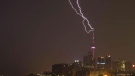 Lightning strikes the CN Tower in Toronto on Monday, July 7, 2014. (George Kourounis / Twitter)