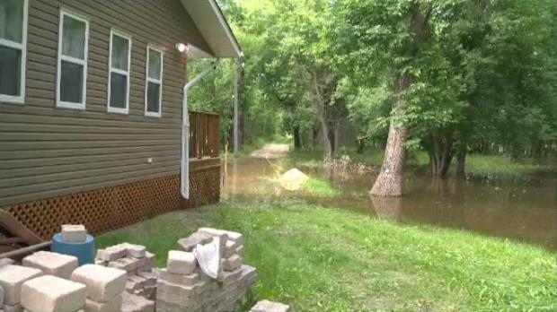 Flood water already hit Guay's property.