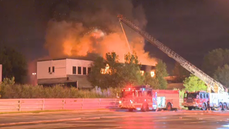 Firefighters are seen battling the fire on Sherbrooke E. early Wednesday morning. (CTV Montreal)