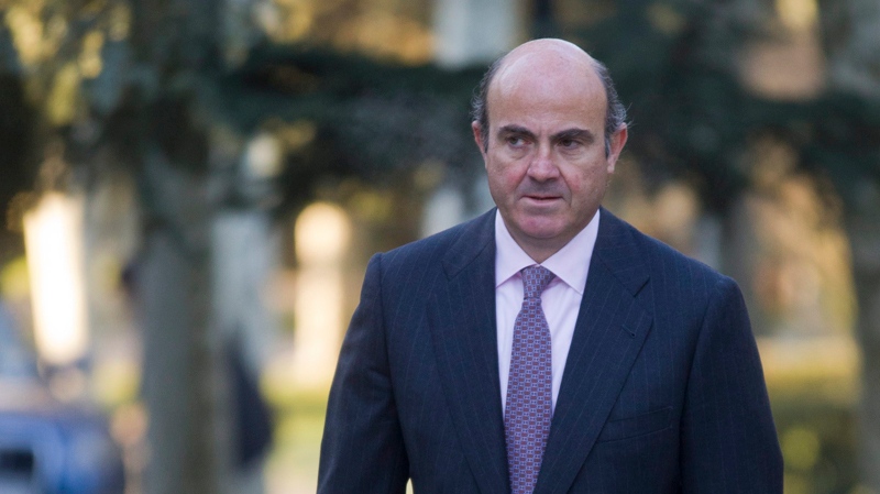 Spanish Economy Minister Luis de Guindos arrives at the Moncloa Palace in Madrid on Dec. 23, 2011.
