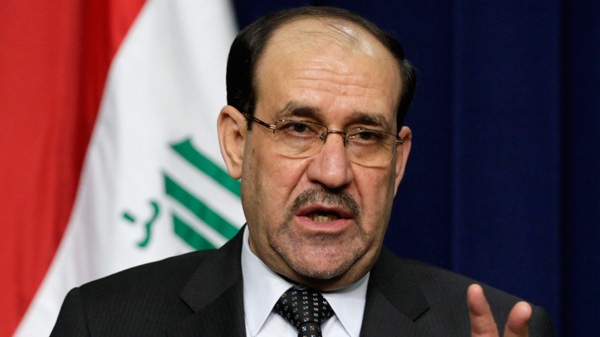 In this Monday, Dec. 12, 2011 file photo, Iraq's Prime Minister Nouri al-Maliki gestures during his news conference with President Barack Obama in the South Court Auditorium on the White House complex in Washington. (AP / Carolyn Kaster, File)