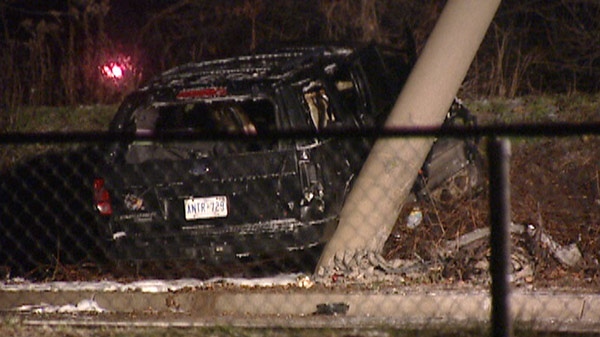 Police investigate after a single-vehicle crash in Cambridge, Ont. on Monday, Dec. 26, 2011.