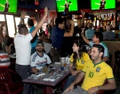 Fans react after the second German goal as they watch the Germany-Brazil World Cup soccer semi-final at PJ's Pub Tuesday, July 8, 2014 in Montreal. (THE CANADIAN PRESS/Ryan Remiorz)