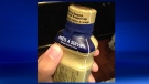 A tampered bottle of Enfamil A+ - Ready to Feed Infant Formula found at a Walmart store in the GTA. (Image: Canadian Food Inspection Agency)