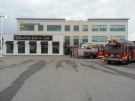 Fire crews remain outside the Wits End Pub and Grill following an overnight fire in London, Ont. on Monday, July 14, 2014. (Justin Zadorsky / CTV London)