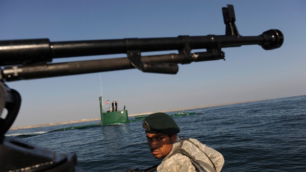 Members of the Iran Navy participate in a drill Wednesday, Dec. 28, 2011 in the Sea of Oman. (International Iran Photo Agency, Ali Mohammadi)