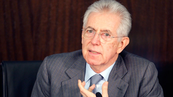Italian Premier Mario Monti gestures as he speaks during a news conference in Rome, Thursday, Dec. 29, 2011. (AP / Pier Paolo Cito)