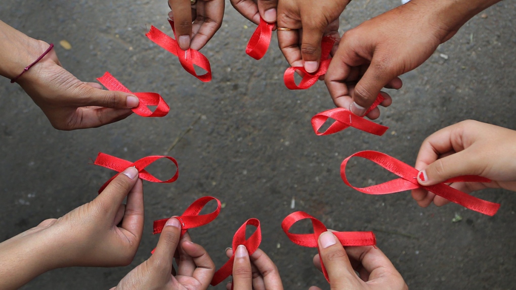 Red ribbons, symbols of HIV-AIDS awareness