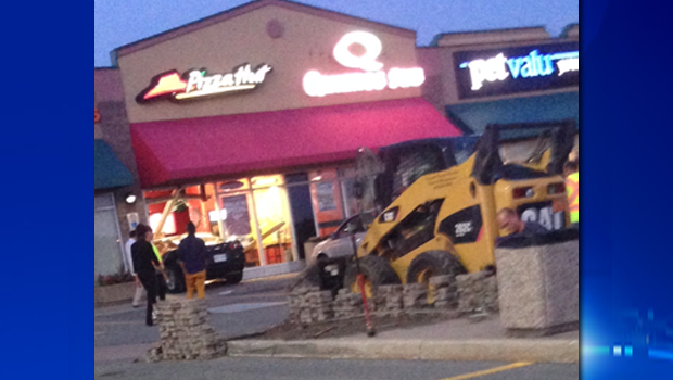 Vehicle smashes through front window of Barrhaven Pizza Hut. (CTV Viewer photo/Kim Lacelle)