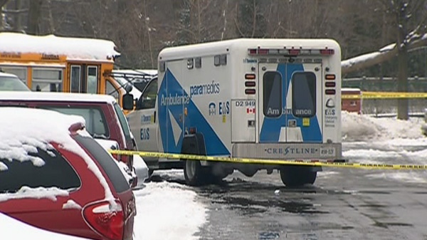 Police investigate the scene of a deadly shooting in Scarborough, Friday, Dec. 30, 2011.