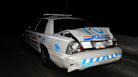 Mounties say a man suspected of driving while intoxicated crashed into a parked police car in northern B.C. on Friday. Dec. 30, 2011. (Police handout) 