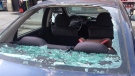 Hail destroyed two of the windows of a car parked in Airdrie on Thursday afternoon