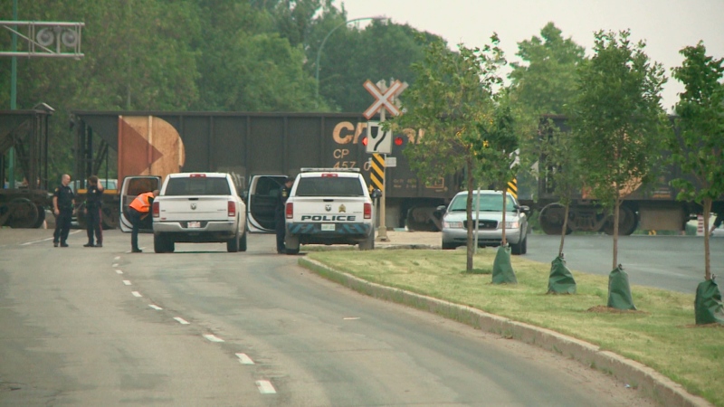 Emergency crews are seen here on scene of a collision between a train and car Thursday afternoon.