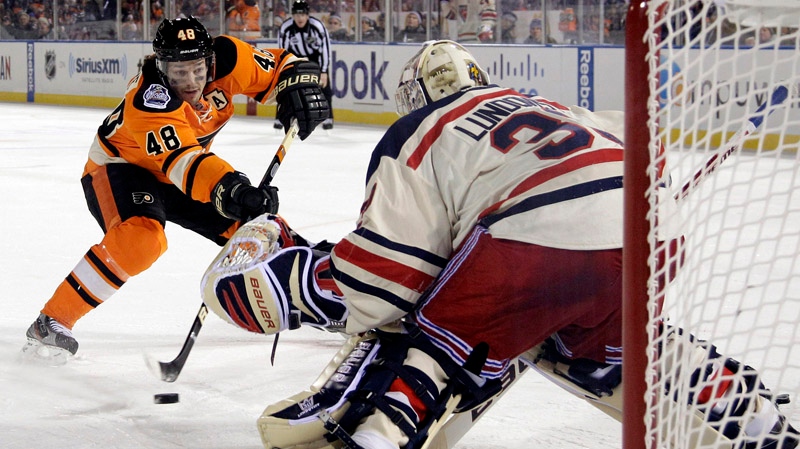 Philadelphia Flyers' Danny Briere (48) cannot get a penalty in shot past New York Rangers' Henrik Lundqvist (30), of Sweden, the third period of the NHL Winter Classic hockey game, Monday, Jan. 2, 2012, in Philadelphia. New York won 3-2. (AP Photo/Matt Slocum)