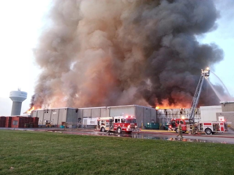 Tecumseh firefighters battle a massive blaze at the Bonduelle plant in Tecumseh, Ont., on Friday, July 18, 2014. (Tecumseh Fire Department)