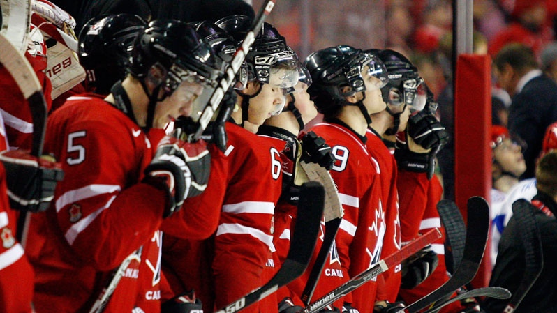 Team Canada's react on the bench to losing to Russia during third period IIHF World Junior Championships semi-final hockey action in this January 2012 file photo. (Jeff McIntosh / THE CANADIAN PRESS)