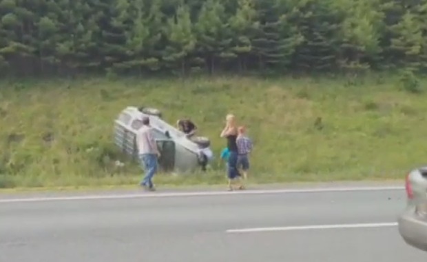 Car turned over on highway 103 