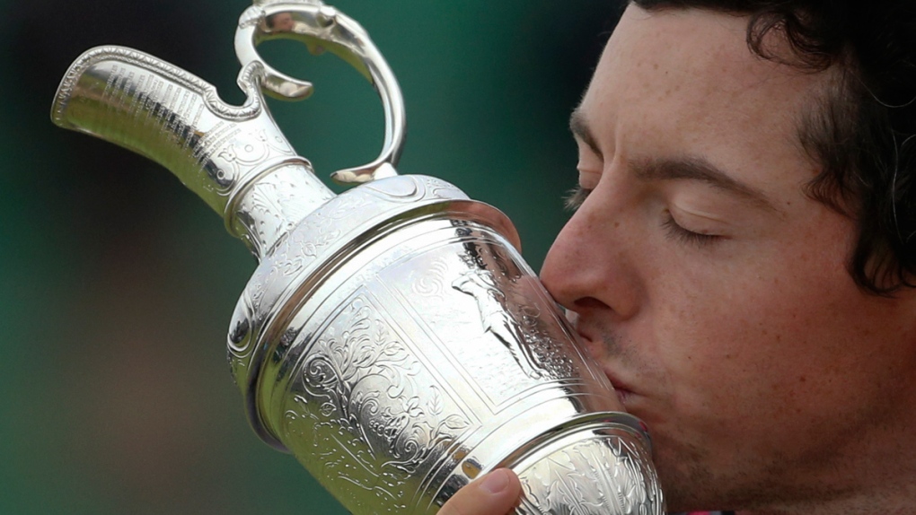 Rory McIlroy kisses the Claret Jug