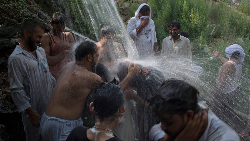 Trying to beat the heat in Islamabad, Pakistan
