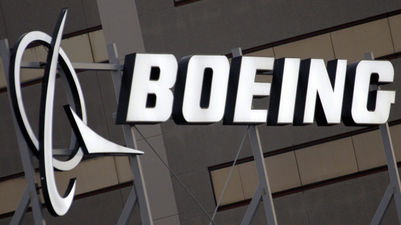 The Boeing Company logo is seen on the property in El Segundo, Calif., Tuesday, Jan. 25, 2011. Boeing Co. said Wednesday, Jan. 26, delays to its new 787 and higher pension expenses will hurt its 2011 profit.  (AP Photo/Reed Saxon)