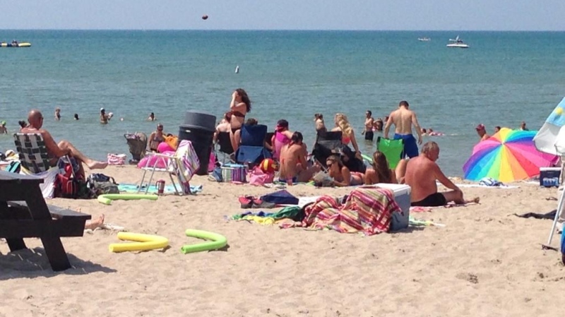 Enjoying the hot weather at the main beach in Grand Bend, Ont. on Tuesday, July 22, 2014. (Gerry Dewan / CTV London)