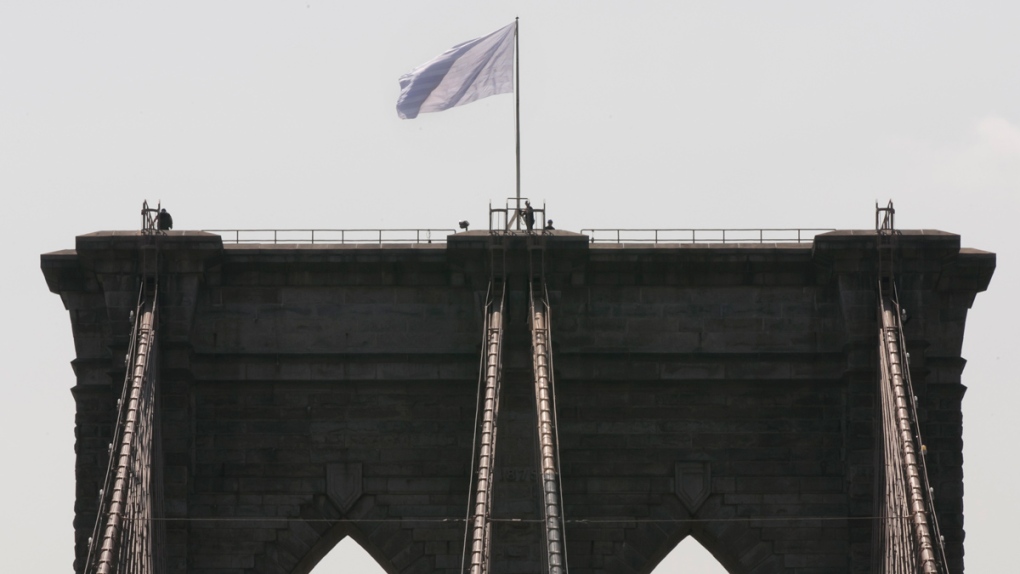 White flag raised at Brooklyn Bridge in New York