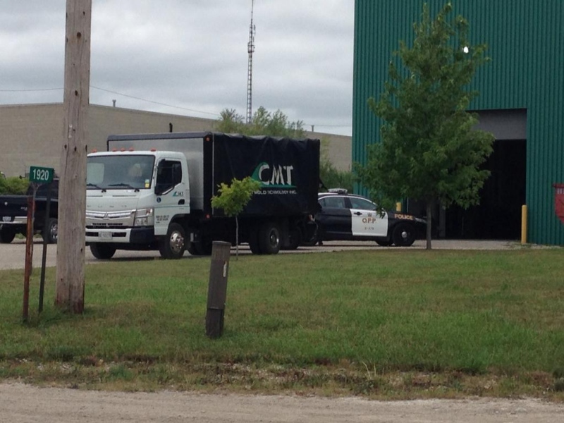 An OPP cruiser can be seen outside Crest Mold Technology in Tecumseh, Ont., on Wednesday, July 23, 2014. (Michelle Maluske/ CTV Windsor)