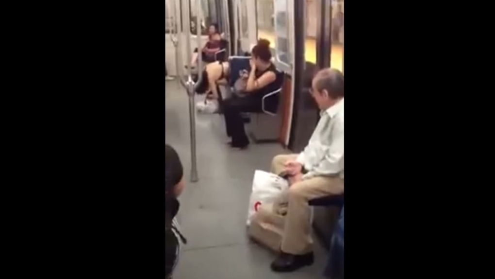 Woman eats raw bird on metro