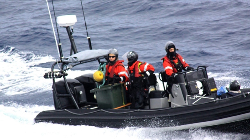 In this photo released by Japan's Institute of Cetacean Research, a boat carrying Sea Shepherd Conservation Society activists aboard, comes close to the Japanese whaling ship Yushin Maru No. 3 in Antarctic waters on Friday Jan. 6, 2012. (AP Photo/Institute of Cetacean Research)