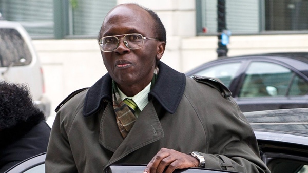Leon Mugesera, accused of helping incite the Rwandan genocide, arrives at Federal Court Monday, Jan. 9, 2012 in Montreal to seek a judicial review and a delay of his expulsion from Canada. (Paul Chiasson / THE CANADIAN PRESS)