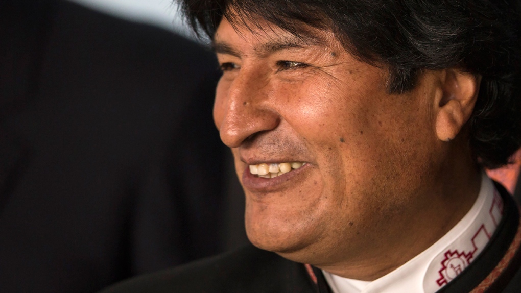 Bolivian president says voters will decide in bed