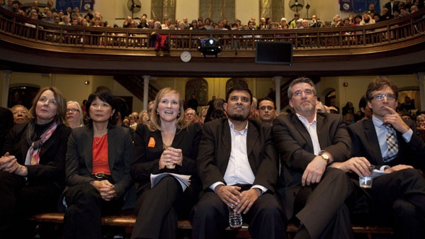 From left, NDP MPs Peggy Nash, Olivia Chow, and candidates Claire Prashaw, Hanif Shaikh, Craig Scott and Justin Duncan listen to speakers during the NDP nomination meeting for the Toronto-Danforth, the former seat of the late Jack Layton, on Monday, January 9, 2012 on Toronto. THE CANADIAN PRESS/Matthew Sherwood