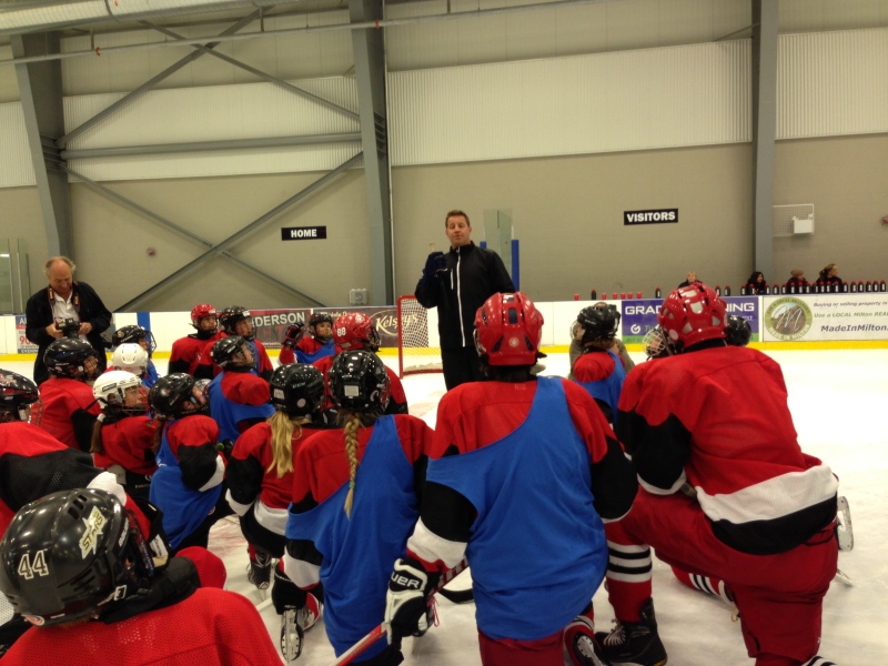 Former NHL star Nick Boynton talks to participants of the Dskate program in this undated image. 