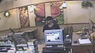 A robbery suspect can be seen in this surveillance video taken at a Subway Restuarant on Ouellette Avenue on Monday, July 30, 2014. (Windsor Police Service)