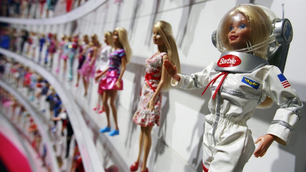 An Astronaut Barbie, right, is shown at the Mattel exhibit, at the New York Toy Fair in this file photo taken Feb. 12, 2010. (AP / Mark Lennihan)