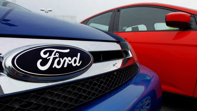 In this July 1, 2012 file photo, the Ford logo is seen on cars for sale at a Ford dealership in Springfield, Ill. (AP / Seth Perlman)