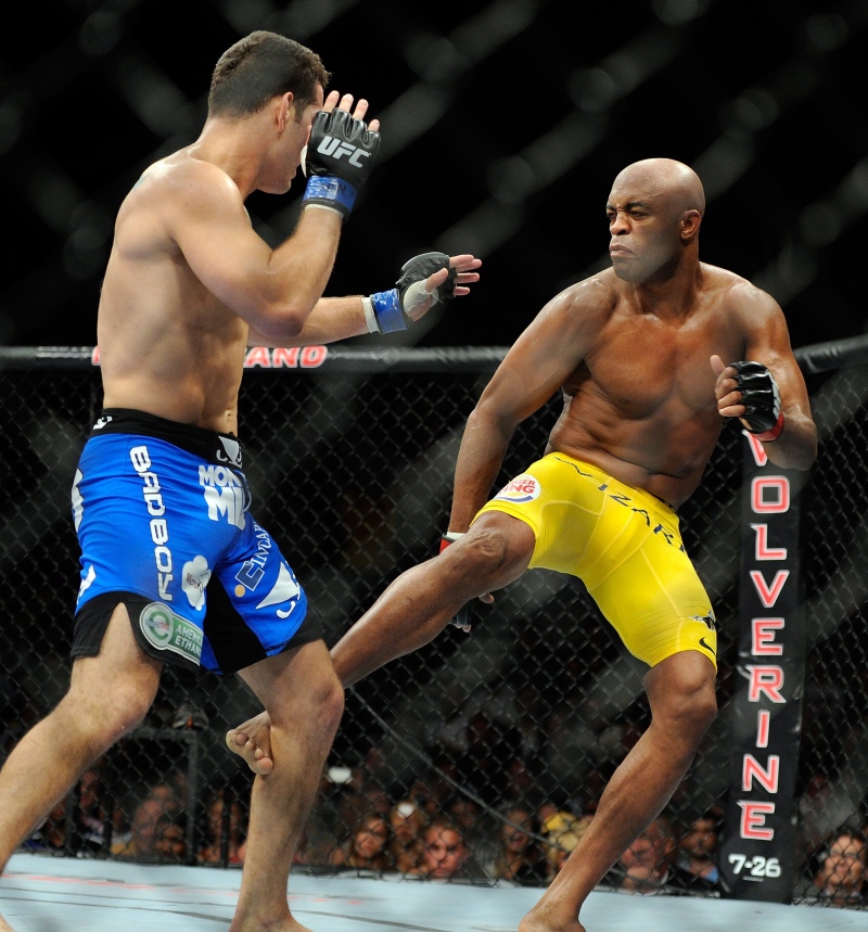 Anderson Silva, right, battle it out with Chris Weidman during their UFC 162 mixed martial arts middleweight championship bout at the MGM Grand Garden Arena on July 6, 2013, in Las Vegas. (AP/David Becker)