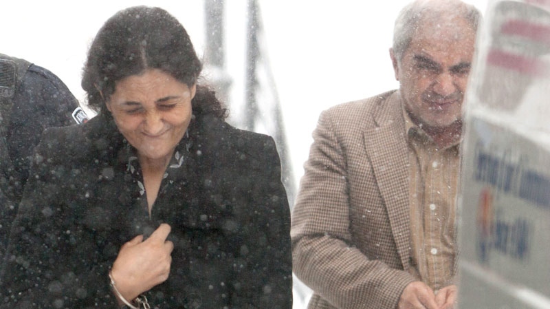 Tooba Yahya and Mohammad Shafia leave the Frontenac county courthouse in Kingston Ont., on Friday Jan. 13, 2012. (Lars Hagberg / THE CANADIAN PRESS)