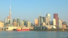 The sun shines over the Toronto skyline 