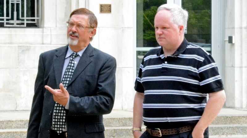 William Melchert-Dinkel, right, and his attorney Terry Watkins leave court in Faribault, Minn. on Friday, Aug. 8, 2014. (Faribault Daily News, Chris Houck)