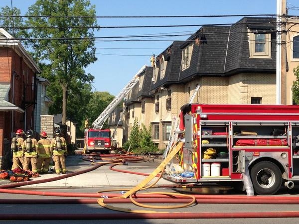 Residents were forced from their homes following a fire on Adelaide Street in London, Ont. on Saturday, Aug. 9, 2014. 
(Bryan Bicknell/CTV London)
