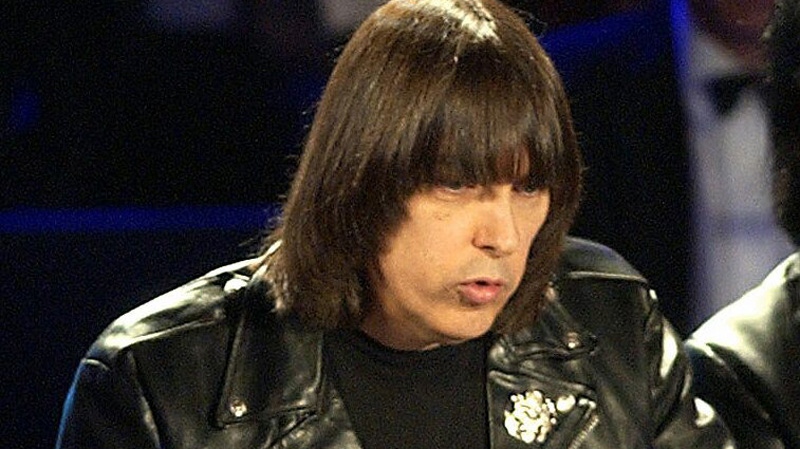 In this March 18, 2002 file photo, Johnny Ramone of the punk rock group The Ramones speaks after the group was inducted into the Rock and Roll Hall of Fame in New York. (AP Photo/Kathy Willens, file)
