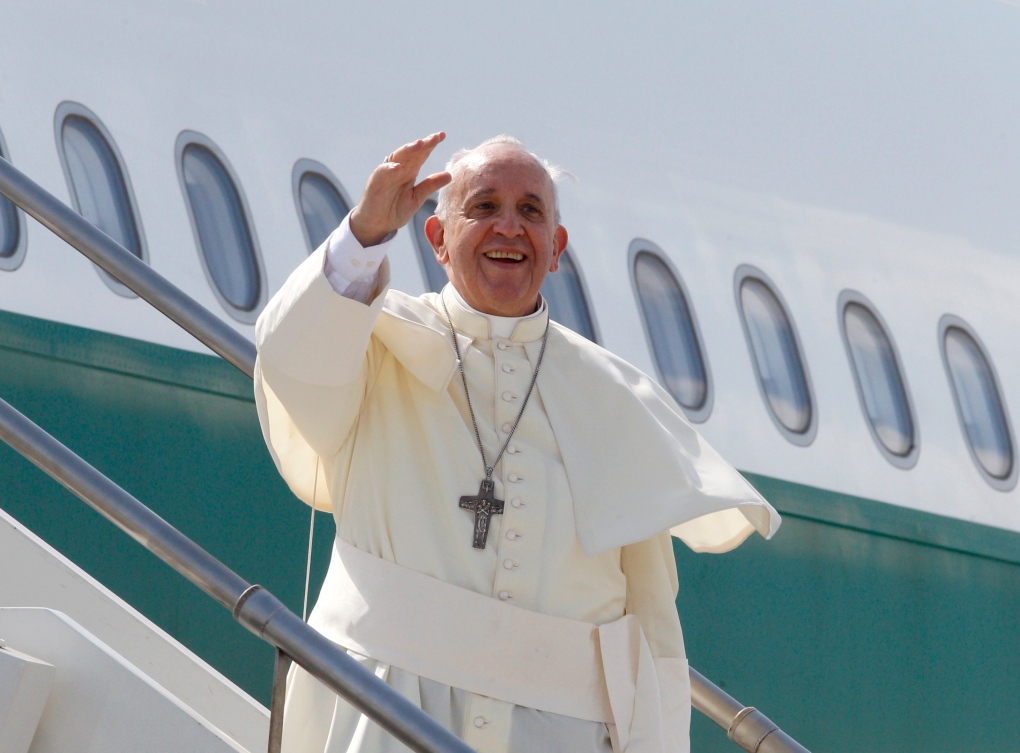 Pope Francis boards a plane to South Korea